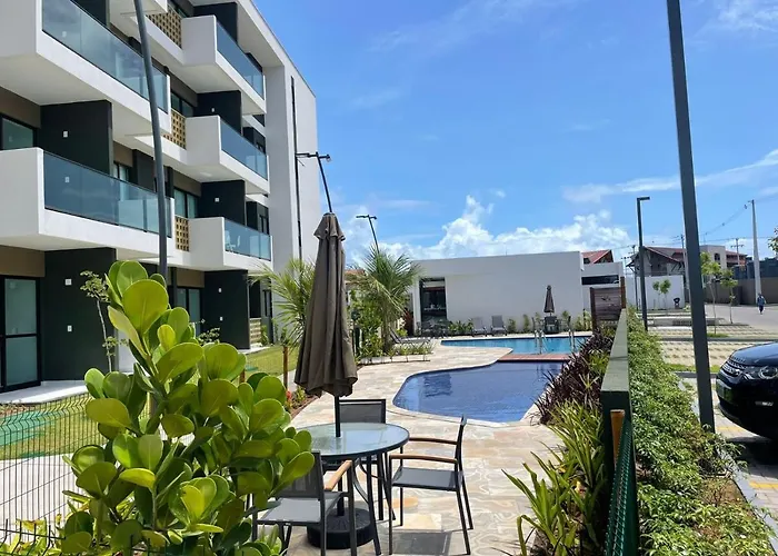 Flat ESTUDIO de LUXO - Praia de Muro Alto - Piscinas - Ideal para CASAIS, famílias com crianças - ap COMPLETO - AR COND, WI FI, NETFLIX, ESTACIONAMENTO - 400 mt do MAR Pôrto das Galinhas